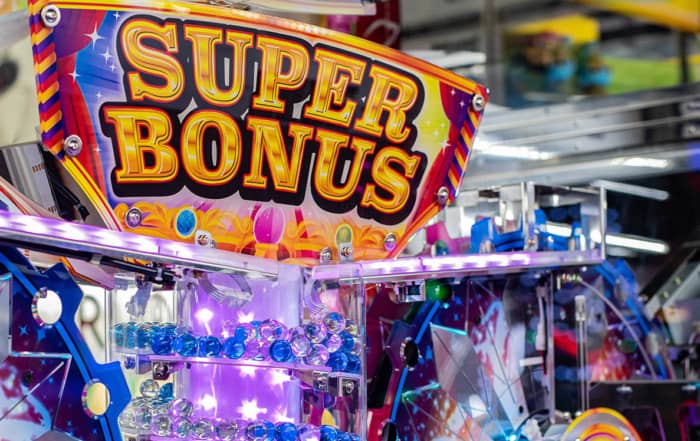 Brightly colored "Super Bonus" sign from a game