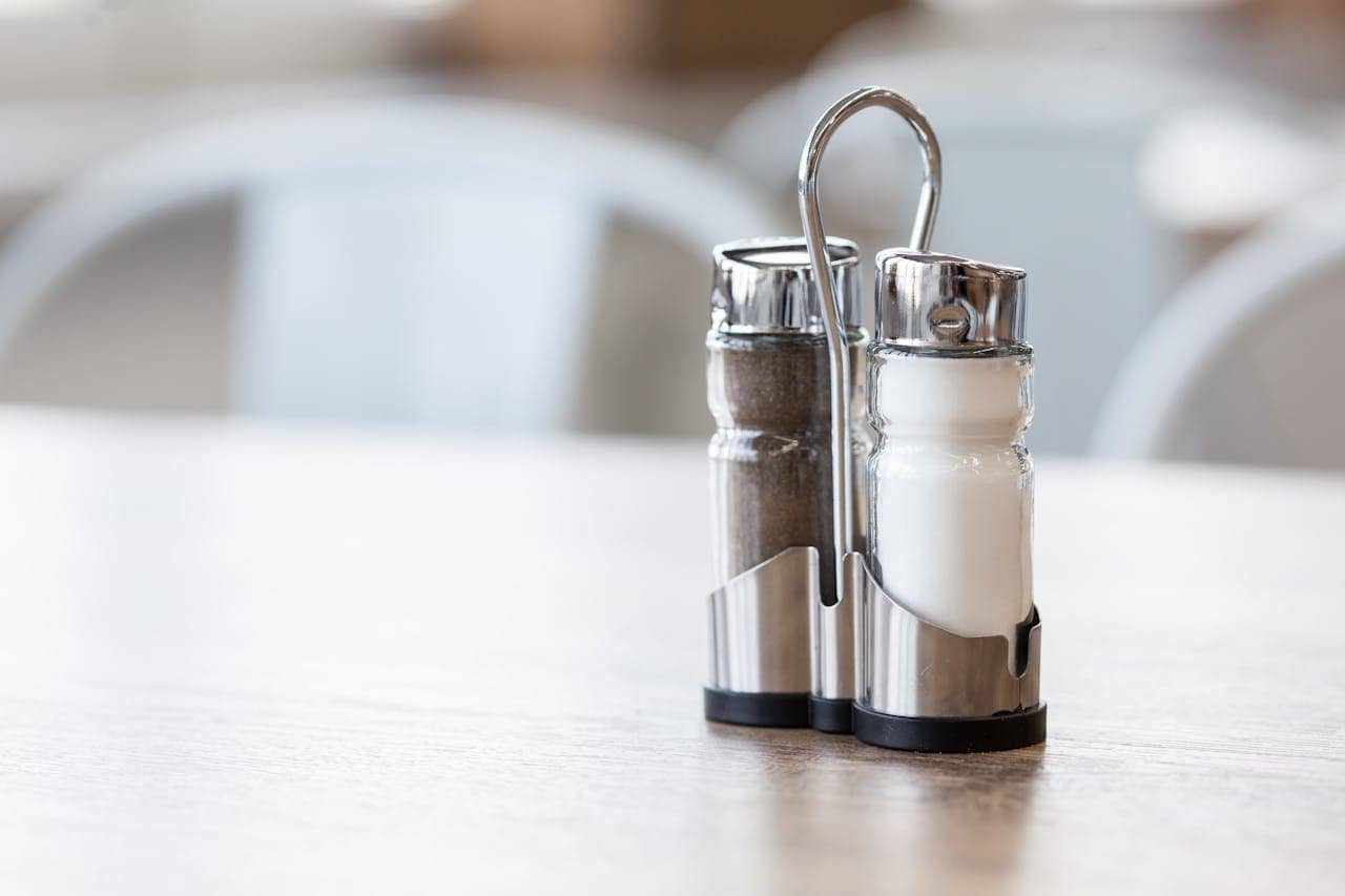 Salt and pepper shakers on a table